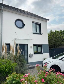 KfW Effizienzhaus 70 % "Doppelhaushälfte mit 3 Stellplätzen und Garten in Kamp-Lintfort Niersenbruch" - Kamp-Lintfort