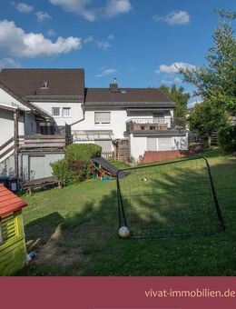 Mehrfamilienhaus mit 6 Wohneinheiten und großem Gartengrundstück. Gute Rendite! - Schmitten