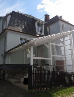 Objekt-Nr.: 11823 - vermietetes Wohn- und Geschäftshaus mit Garage und Garten in ruhiger Lage in Elsterberg - Elsterberg