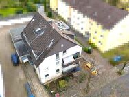 Freistehendes und ausgebautes 6-Parteienhaus mit 5 Garagen in gefragter Lage von Quettingen - Leverkusen