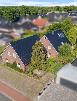 Wohnen und Arbeiten auf hohem Niveau~EFH mit vielseitig nutzbarem Praxisbereich in Westoverledingen - Westoverledingen