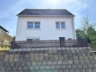 Einfamilienhaus mit ausgebautem Keller, großem, sonnigen Grundstück und Carport - Rockenhausen