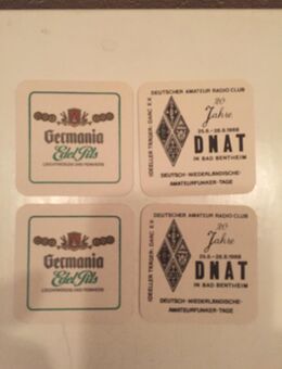 4 Bierdeckel Germania Edelpils mit Werbung auf Rückseite abzugeben - Emsdetten Zentrum