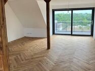 Erstbezug! Loftwohnung mit Loggia, Fahrstuhl, Holzdielen, Stellplatz, u.v.m. - Lüneburg