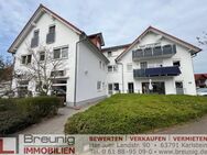 Komplett vermietetes MFH mit drei Gewerbe- und vier Wohneinheiten in Ortsmitte - Karlstein (Main)
