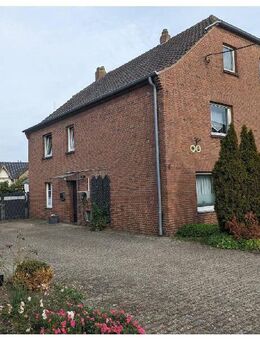 Einfamilienhaus mit Einliegerwohnung auf großem Grundstück in Xanten-Marienbaum - Xanten