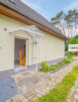 IMMOBERLIN.DE - Ansprechendes Haus mit Westgarten & Garage in harmonischer Lage - Luckenwalde
