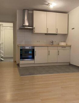 1-Zimmer-Wohnung mit eigenem Garten, EBK und TG-Stellplatz - Erlangen