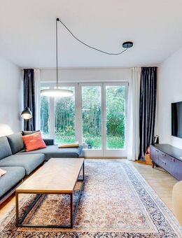AIGNER - Attraktive 3-Zimmer-Gartenwohnung in begehrter Lage in Solln - München