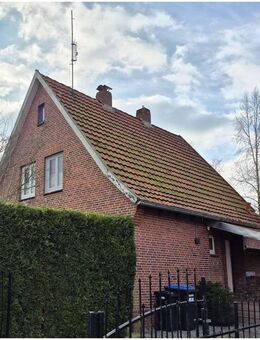 Gemütliches Einfamilienhaus mit Ofen, Terrasse und großem Garten in ruhiger Lage - Oberndorf (Niedersachsen)