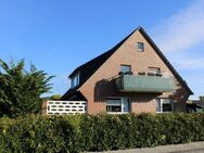 Vermietetes Zweifamilienhaus in ruhiger Wohnsiedlung in Butjadingen-Burhave für Kapitalanleger - Butjadingen