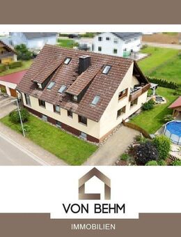 von Behm Immobilien - Gepflegtes Zweifamilienhaus mit außergewöhnlichem Gartenidyll - Wilburgstetten