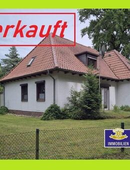 Walmdach Winkelbungalow mit Teilkeller, Doppelgarage, in begehrter Lage in Fahrenhorst - Stuhr