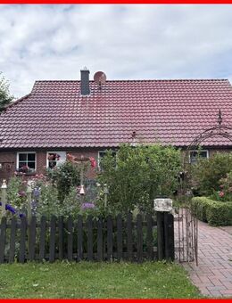 Idyllisch gelegene Erdgeschosswohnung in Stadland - Stadland
