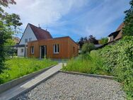 Saniert: Einfamilienhaus mit neu gebauter Einliegerwohnung in ruhiger Südlage - München