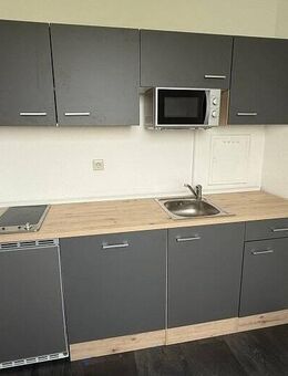 tolle 2 Raumdachgeschosswohnung mit Balkon und EBK zum abkaufen - Leipzig