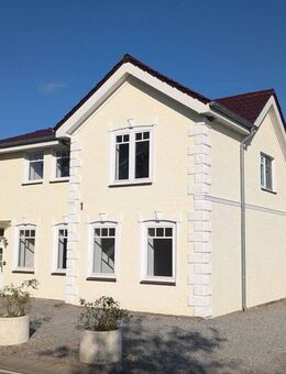 Modernisiertes Mehrfamilienhaus mit vielfältiger Nutzungsmöglichkeit und großem Grundstück! - Stoltebüll