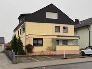 Gepflegtes Mehrfamilienhaus mit Garagen in Walldürn - Walldürn