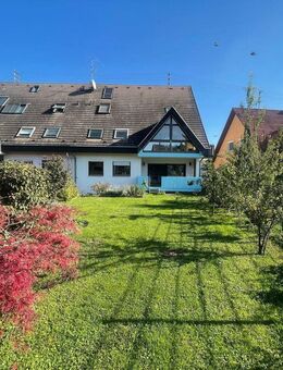 5-Zimmer-Wohnung mit Einliegerwohnung im Untergeschoss und großem Garten in Gottenheim - Gottenheim