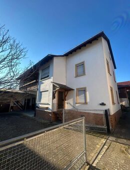 Angebot für Handwerker mit Potential - massiv gebautes Einfamilienhaus mit Werkstatt und Garage - Rheinau