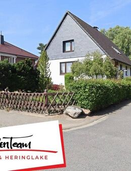 Solides Einfamilienhaus auf großzügigem, teilbarem Eckgrundstück in Halstenbek zum Bauen & Erweitern - Halstenbek
