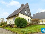 In ruhiger Ortsrandlage von Flintbek - Einfamilienhaus mit Renovierungsbedarf - Flintbek