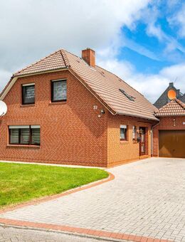 Charmantes Einfamilienhaus mit Wintergarten und Garage in zentraler Lage - Südbrookmerland