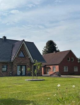 Zwei Häuser auf einem Grundstück: Modernes Wohnen trifft auf Sanierungsprojekt! - Großheide