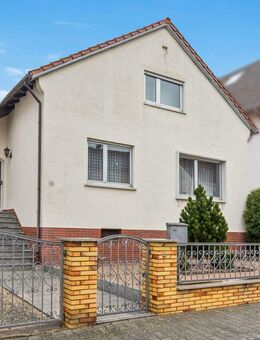 Familienfreundliches Einfamilienhaus auf großem Grundstück in begehrter Wohnlage von Wixhausen - Darmstadt