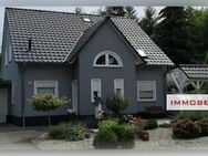 IMMOBERLIN.DE - Attraktives Einfamilienhaus mit Gartenidylle in familienfreundlicher Lage - Jüterbog