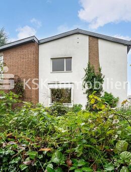 Zweifamilienhaus mit großem Grundstück, Wintergarten und Kamin-Sitzecke. - Erftstadt