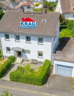 ++ KRAG Immobilien ++ Zwei Generationen unter einem Dach: separate Wohnungen, Garten, Ausbaupotenzial - Biebertal