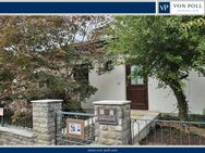 Einfamilienhaus mit Naturgarten und 2 Garagen in grüner und ruhiger Wohnlage zu verkaufen - Würzburg