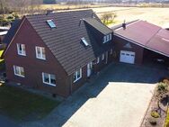 Einfamilienhaus mit Einliegerwohnung - 1 Hektar Land und Stahlhalle - Wiesmoor