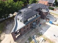 IMMOBILIEN GUMNIOR präsentiert: Neubau! Moderne Obergeschosswohnung mit Loggia in Emsbüren - Emsbüren