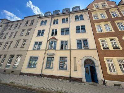 Zuverlässige Kapitalanlage: Vermietete Eigentumswohnung mit Tageslichtbad, Balkon und Gartenanteil in ruhiger Umgebung zu verkaufen.