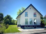 Neues Einfamilienhaus mit Einliegerwohnung mit Süd West Grundstück in Ittenbach - Königswinter