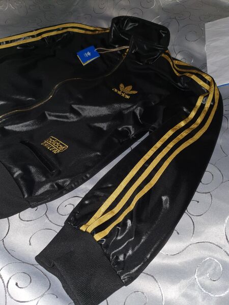 Adidas chile 62 outlet anzug schwarz gold