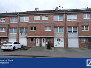 Wohnen auf mehreren Ebenen: Split- Level- Reihenmittelhaus mit Garten und Garage in MG- Lürrip! - Mönchengladbach