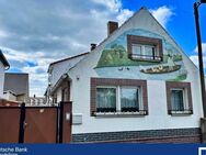 Malerei trifft Wohnkomfort: Einfamilienhaus mit einzigartiger Fassadengestaltung in Raddusch - Vetschau (Spreewald) Zentrum