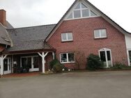 Hofstelle mit 3-Familienhaus und Hallen - Hüllhorst