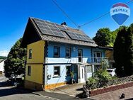 Einfamilienhaus mit Garage, Garten, Nebengebäude und PV-Anlage in Isselbach - Isselbach