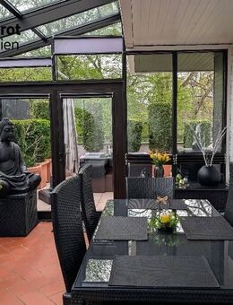 Außergewöhnliche Dachterrassenwohnung mit zusätzlichem Wintergarten in Solln - München
