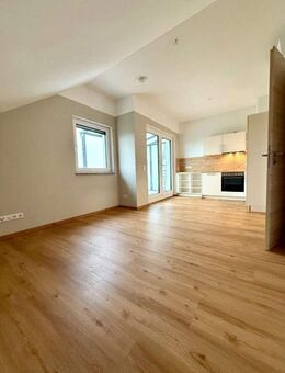 Barrierefreie 2-Zi-DG-WHG mit Aufzug, Balkon und Tiefgaragenstellplatz in ruhiger Wohnlage - Altötting