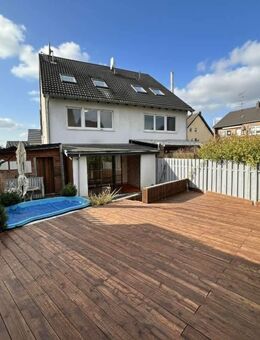 Charmante Doppelhaushälfte mit Wintergarten, Garten und vielseitigen Nutzungsmöglichkeiten - Frechen