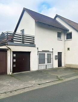 Söhlde-Bettrum: Zweifamilienhaus mit Gewerbeanteil - Söhlde