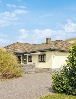 Winkelbungalow mit großem Grundstück in ruhiger Lage von Frankfurt-Preungesheim - Frankfurt (Main)
