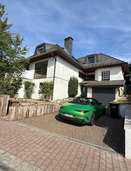 villenähnliche Zweifamilienhaus mit 1 Zimmerapartment und Gewerbefläche ( Garage) - Aarbergen
