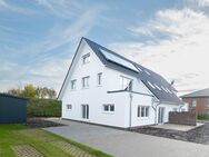 Elegantes Wohnen im Mehrfamilienhaus: 3-Zimmer-Wohnung im Obergeschoss links - Am Wohnpark Hamfeld - Hemmoor