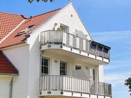 Helle 3 Zimmer-Dachgeschosswohnung mit Balkon und Stellplatz in Rethwisch - Börgerende-Rethwisch